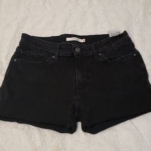 Black Levi's shorts.